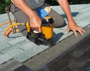 Shingles being put on a new roof