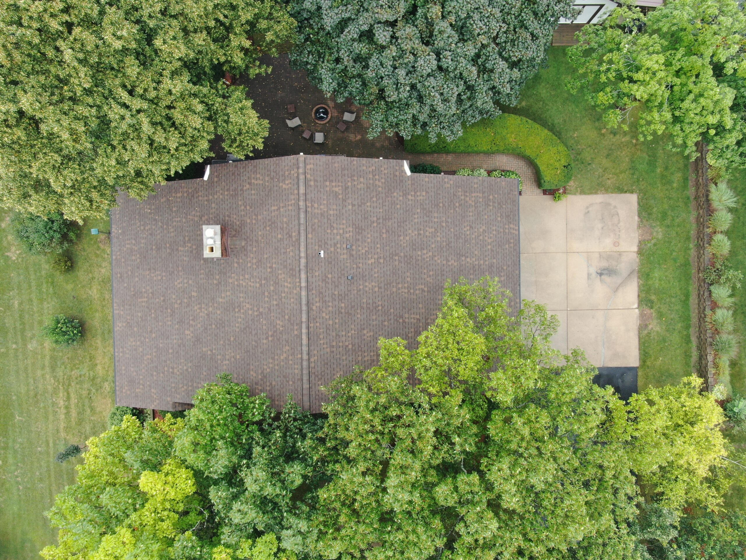 An aerial view of a Wisconsin home with new Atlas asphalt shingles.