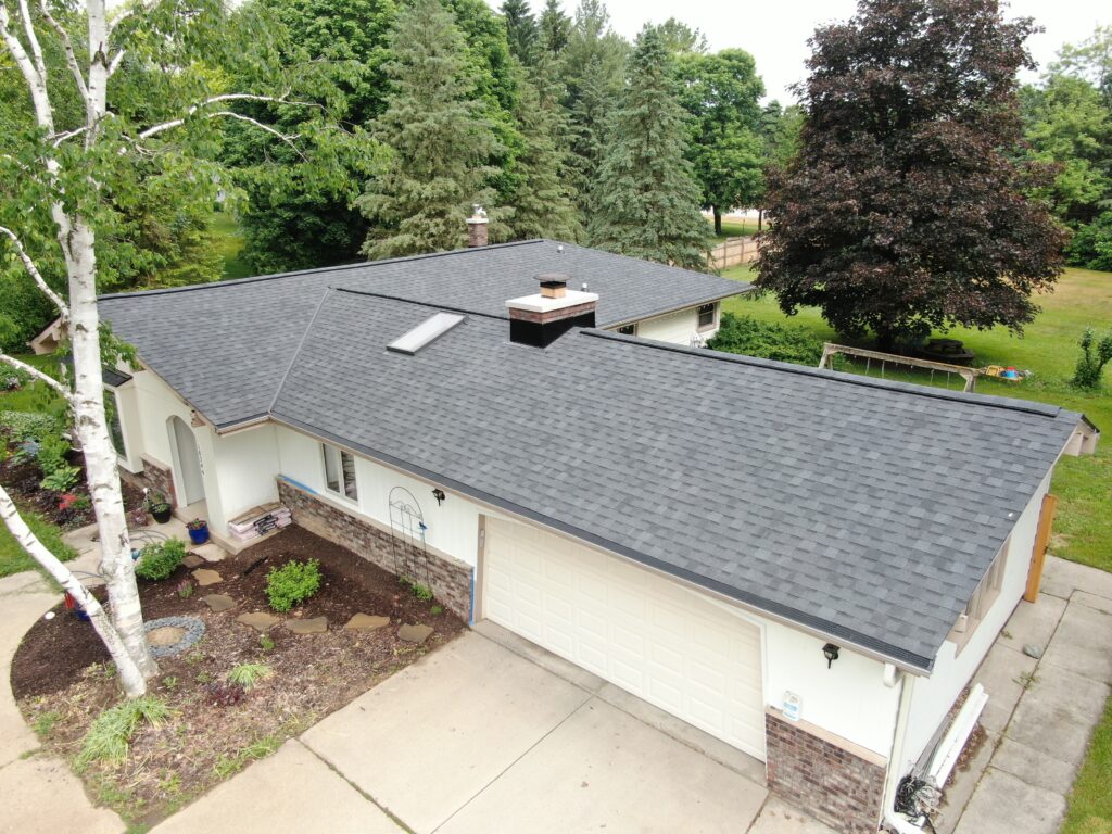 Wisconsin home with newly installed Atlas Black Shadow shingles.