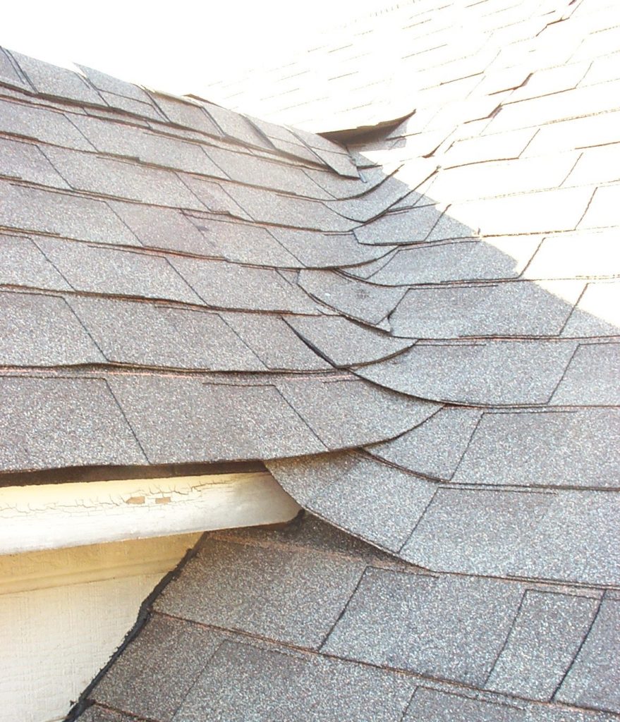 Shingles incorrectly installed in a roof valley. 